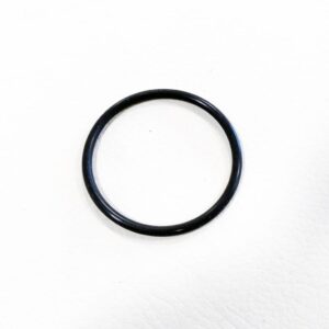Black O shaped ring laying flat on white background